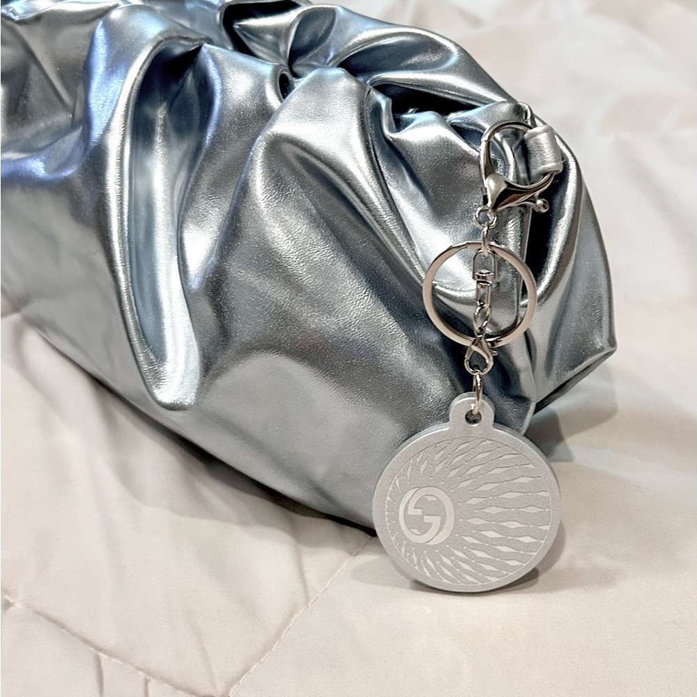 Gucci ornament bagcharm with silver blue dumpling clutch
